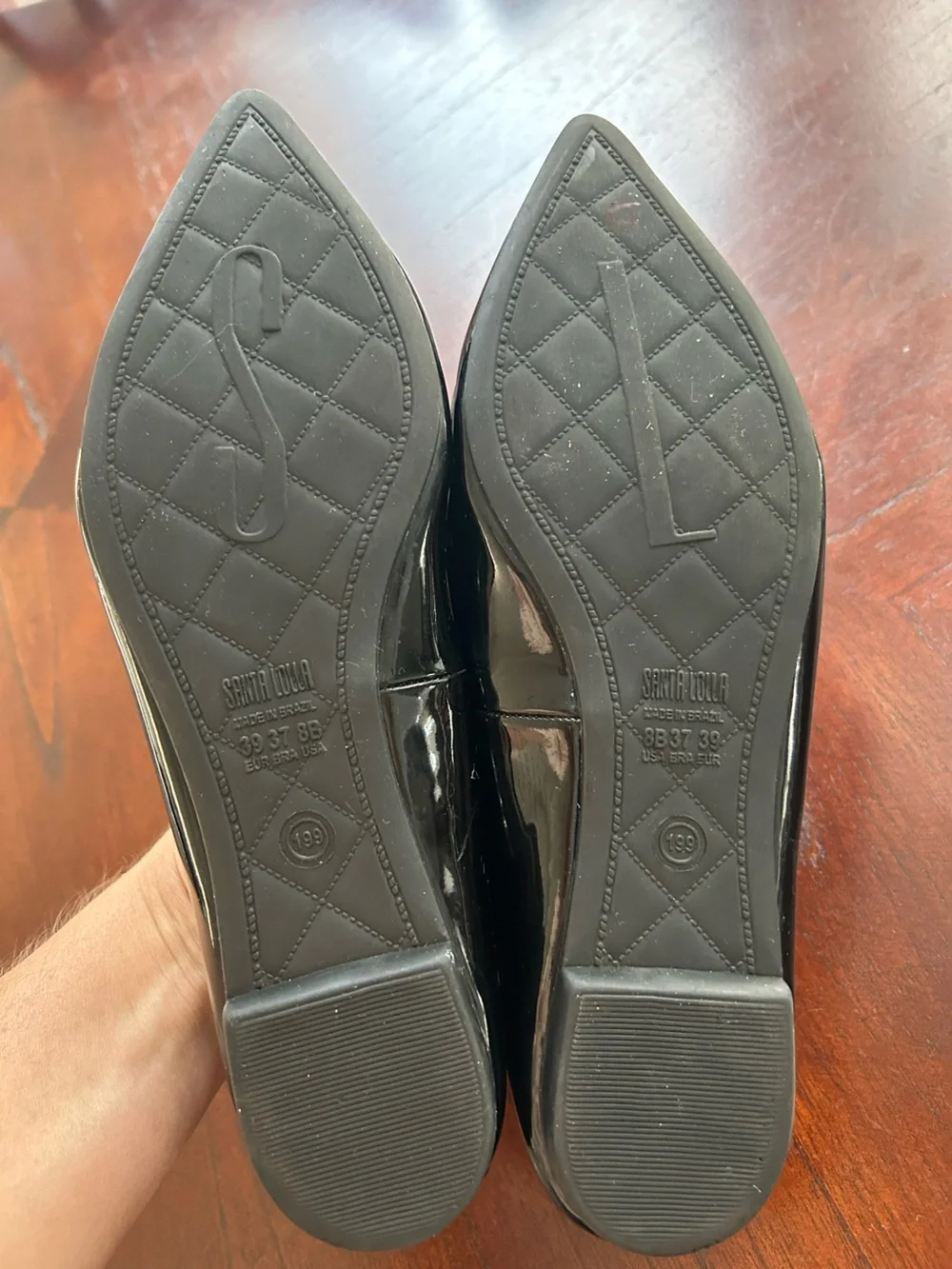 Pointed Toe Black Patent Loafer Flats size 8B It shows wear on the inside.